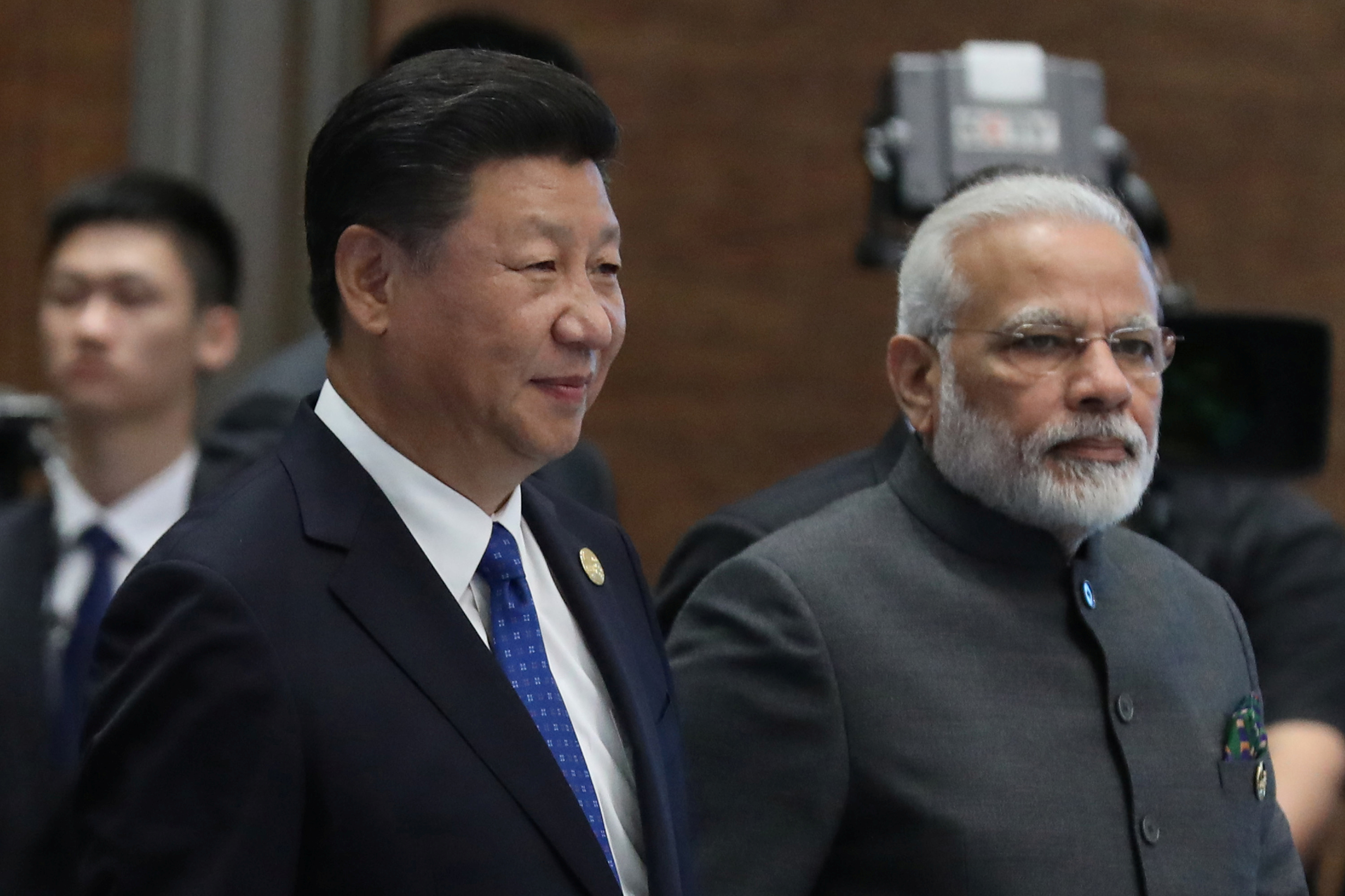 Chinese President Xi Jinping and Indian Prime Minister Narendra Modi, arrive for the 'Dialogue of Emerging Market and Developing Countries' on the sidelines of the 2017 BRICS Summit in Xiamen
