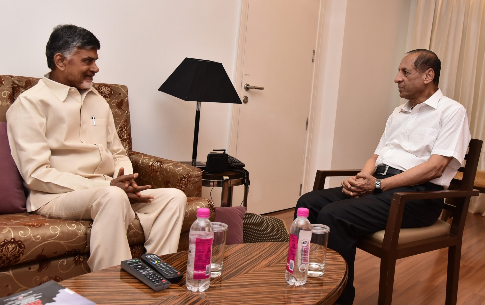 Hyderabad: Andhra Pradesh Chief Minister N. Chandrababu Naidu calls on Andhra Pradesh and Telangana Governor ESL Narasimhan in Hyderabad, on April 22, 2018. (Photo: IANS)