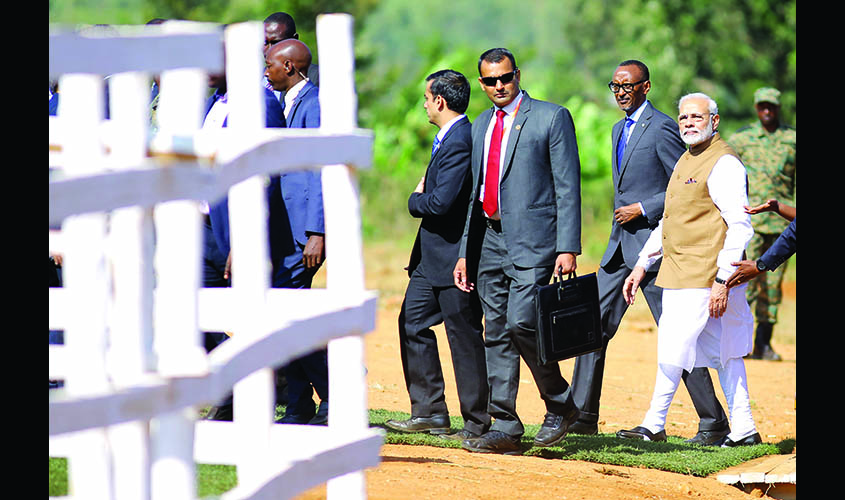 India Prime Minister Narendra Modi accomapanied by Rwandan President Paul Kagame arrive at the Rweru model village in Bugesera district, Eastern Province