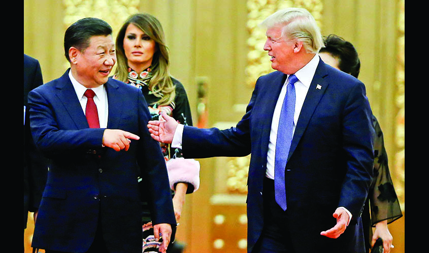 U.S. President Donald Trump and China's President Xi Jinping arrive at a state dinner at the Great Hall of the People in Beijing