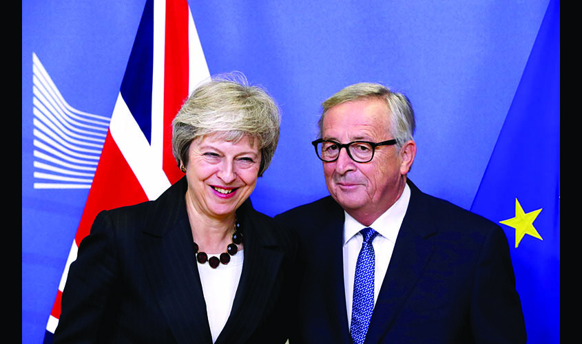 British Prime Minister Theresa May and European Commission President Jean-Claude Juncker meet to discuss draft agreements on Brexit, at the EC headquarters in Brussels