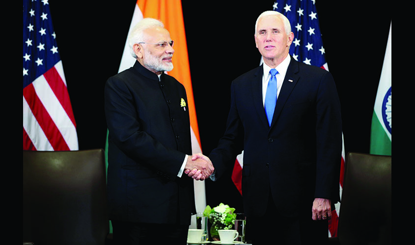 India's Prime Minister Narendra Modi shakes hand with U.S. Vice President Mike Pence during their bilateral meeting in Singapore