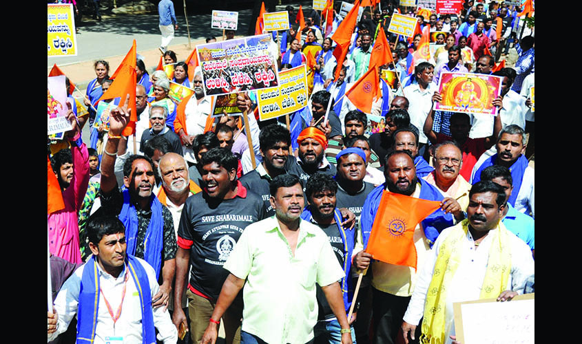 Bengaluru: People participate in a protest against Supreme Court's decision allowing entry of women in the age group of 10 to 50 years into Kerala's Sabarimala temple; in Bengaluru on Oct 27, 2018. (Photo: IANS)