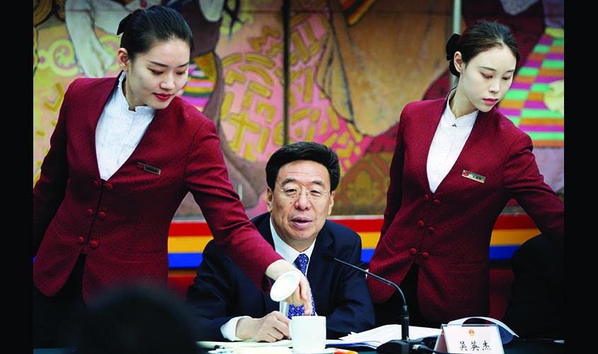 Communist Party Secretary of Tibet Autonomous Region Wu Yingjie attends a news conference during the National People's Congress (NPC) in Beijing