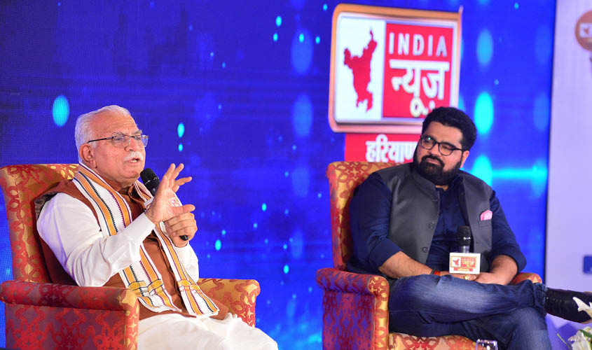 Haryana Chief Minister Manohar Lal Khattar with Kartikeya Sharma, Founder and Promoter, iTV Network, at the event in Chandigarh on Wednesday.'