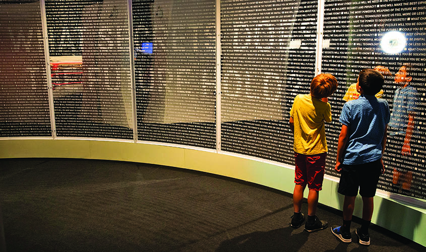 An undated photo provided by the Science Museum Group shows visitors at the Science Museum in London's exhibit, “Top Secret: From Ciphers to Cyber Security.