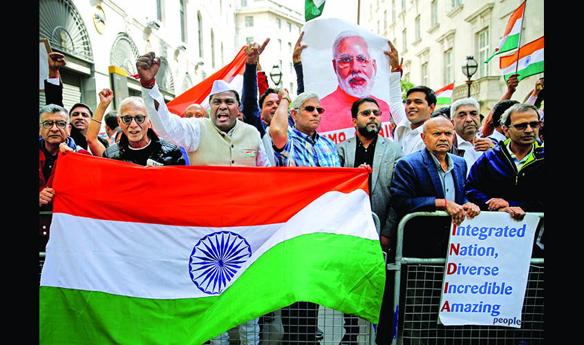 Demonstrators protest the scrapping of the special constitutional status in Kashmir by the Indian government, outside the Indian High Commission in London