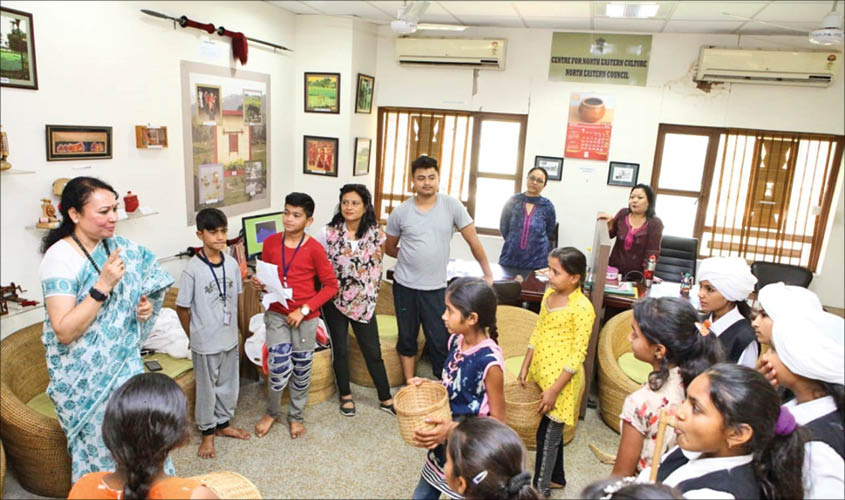CCRT chairperson Hemlata S. Mohan with students of North East at a cultural exhibition organised at its Delhi centre.