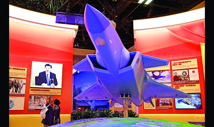 Model depicting J-20 stealth fighter of People's Liberation Army (PLA) is seen at an exhibition on China's achievements marking the 70th anniversary of its founding at the Beijing Exhibition Center, in Beijing
