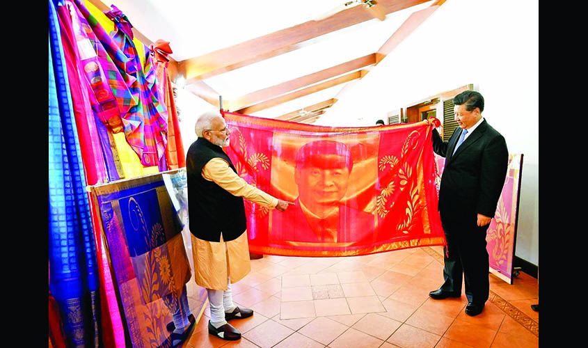 Mahabalipuram: Prime Minister Narendra Modi and Chinese President Xi Jinping exchange gifts on the 2nd day of an Informal Summit, in Tamil Nadu's Mahabalipuram on Oct 12, 2019. (Photo: IANS/PIB)