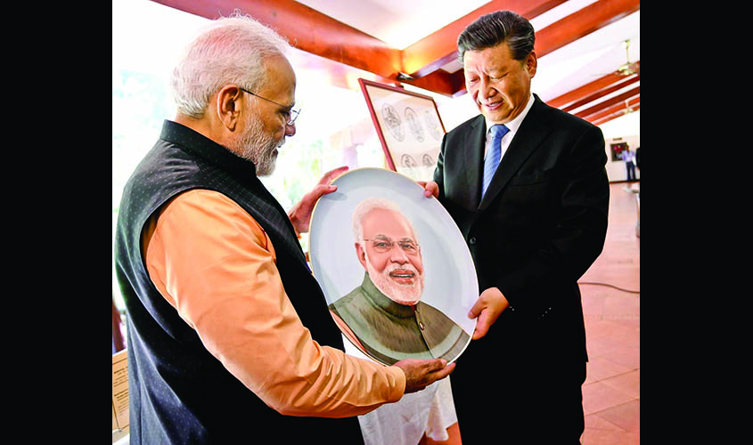 Mahabalipuram: Prime Minister Narendra Modi and Chinese President Xi Jinping exchange gifts on the 2nd day of an Informal Summit, in Tamil Nadu's Mahabalipuram on Oct 12, 2019. (Photo: IANS/PIB)