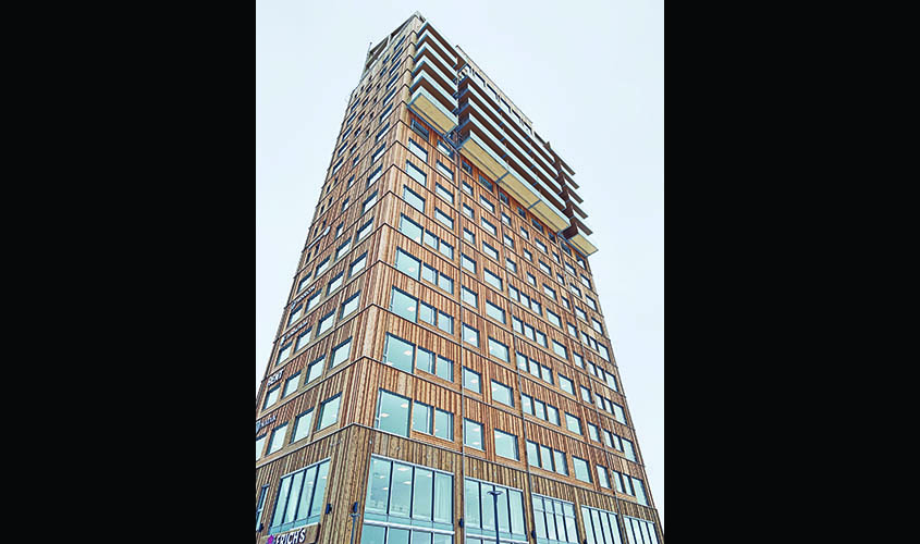 The 18-story Mjostarnet office and residential tower by Voll Arkitekter in Brumunddal, Norway. (Oystein Elgsaas via The New York Times)