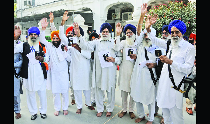 Amritsar: Sikh pilgrims leave for Pakistan to participate in celebrations to commemorate the 550th birth anniversary of Guru Nanak Dev, from Amritsar on Nov 5, 2019. A total 1,303 Indian Sikh pilgrims on Tuesday left for Pakistan via Attari border to part