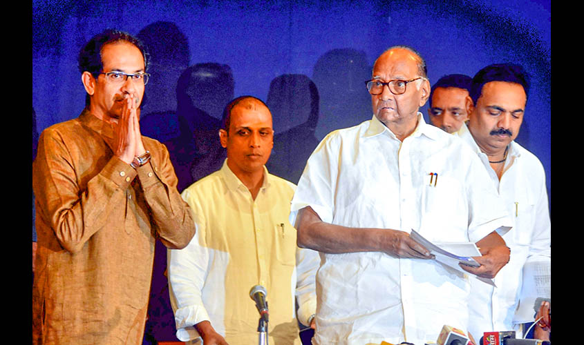 Mumbai: Shiv Sena chief Uddhav Thackeray and NCP President Sharad Pawar arrive to address a joint press conference in Mumbai on Nov 23, 2019. (Photo: IANS)