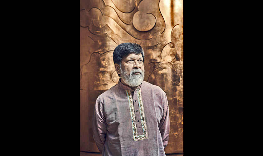 Shahidul Alam, the acclaimed Bangladeshi photojournalist and activist, at the Rubin Museum of Art, which is presenting “Shahidul Alam: Truth to Power,” his first museum retrospective in the United States, in New York, Nov. 8, 2019. (Christopher Gregor