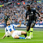 LONDON, April 7, 2019 (Xinhua) — Manchester City’s Benjamin Mendy (R) is tackled by Brighton’s Martin Montoya during the FA Cup Semi-Final match between Manchester City and Brighton and Hove Albion at Wembley Stadium in London, Britain on April 6, 2019.
