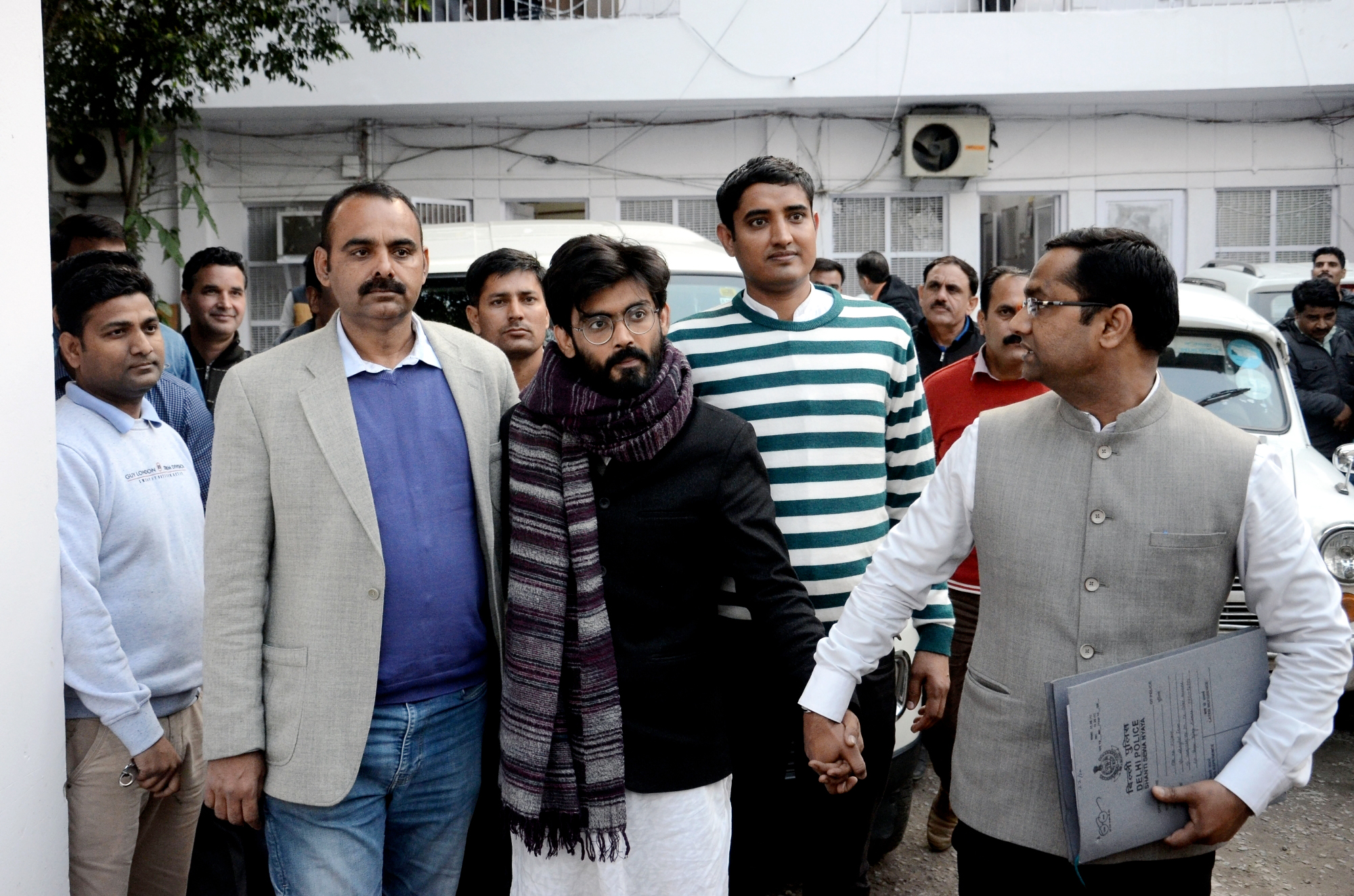 New Delhi: JNU student Sharjeel Imam, who was arrested from Bihar for allegedly giving inflammatory speeches, being taken to be produced before the Chief Metropolitan Magistrate, Patiala House courts, at his residence in New Delhi on Jan 29, 2020. Accordi