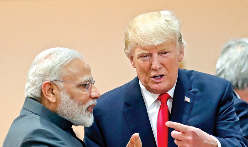 US President Donald Trump chats with Prime Minister Narendra Modi during a working session at the G20 leaders summit in Hamburg, Germany on July 8, 2017. REUTERS