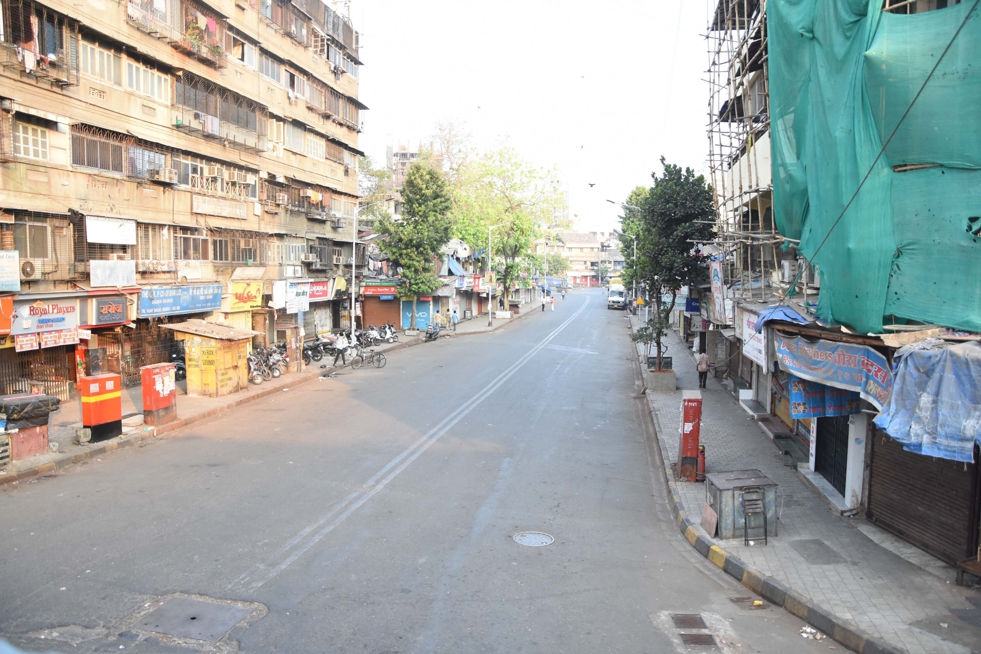 Mumbai: The road adjoining Dadar Central Railway Station bears a deserted look on Day 4 of the lockdown imposed in the wake of the coronavirus pandemic, in Mumbai on March 28, 2020. (Photo: IANS)
