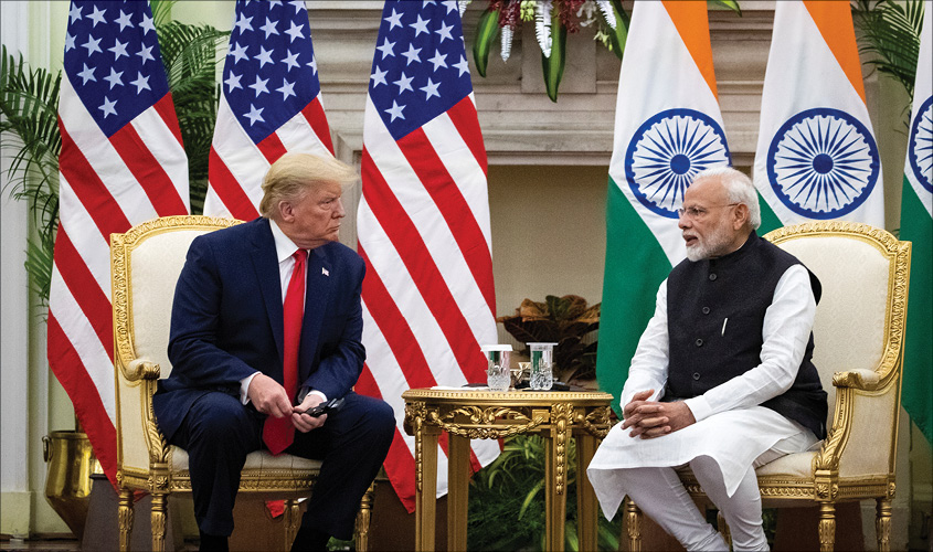 Prime Minister Narendra Modi speaks to US President Donald Trump during a meeting at Hyderabad House in New Delhi, 25 February, 2020. REUTERS