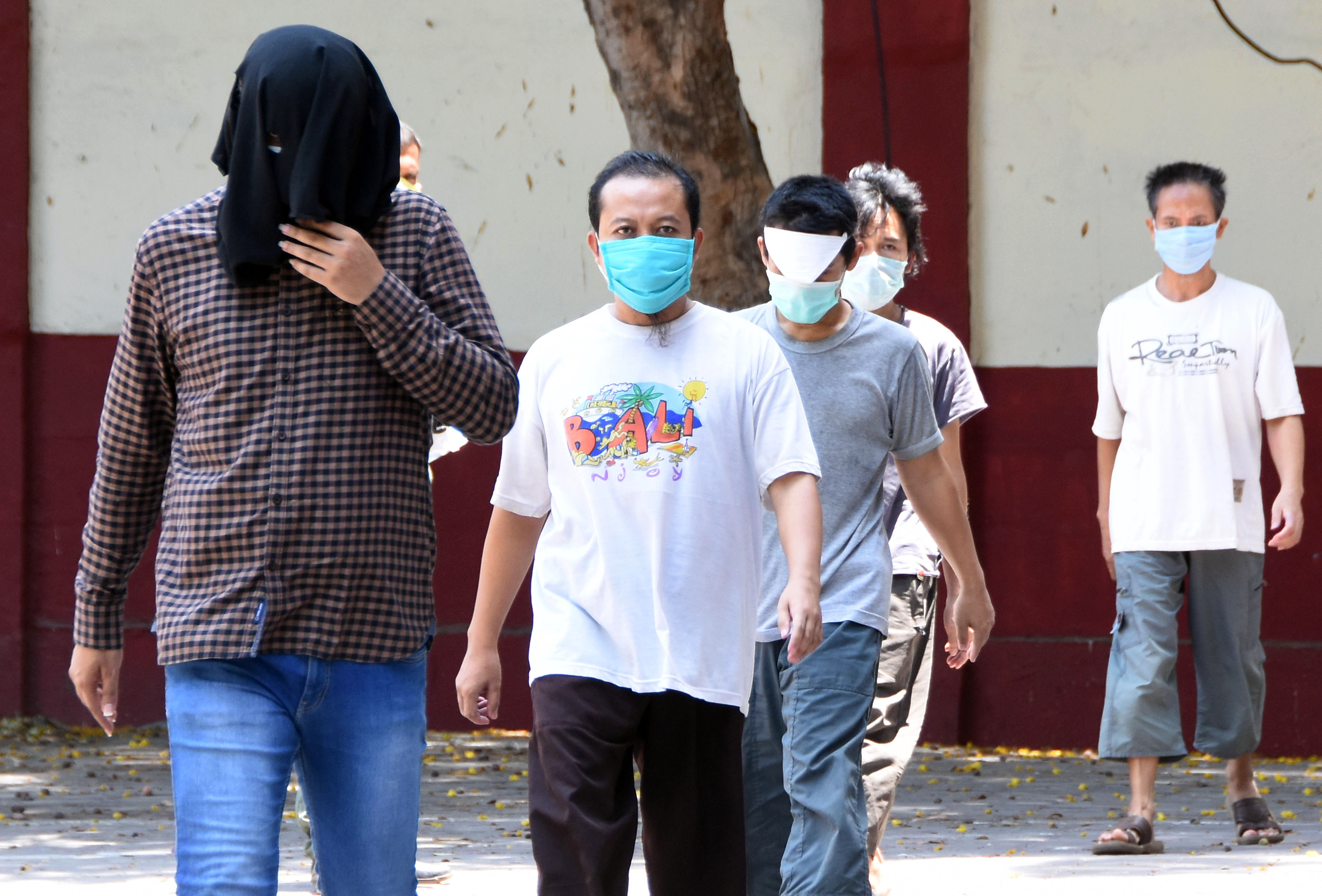 Foreign nationals from Indonesia, who had attended the Tablighi Jamaat event at Markaz Nizamuddin, being taken to Bandra court