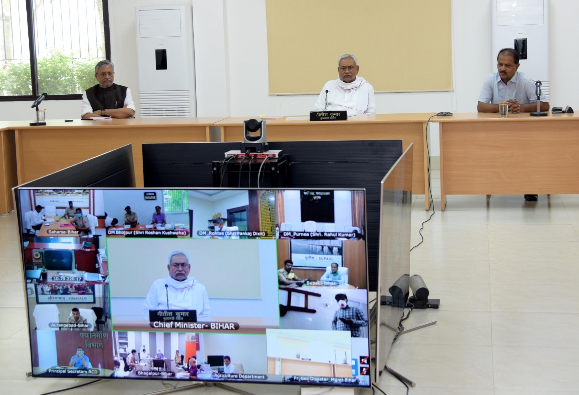 Patna: Bihar Chief Minister Nitish Kumar accompanied by Deputy Chief Minister Sushil Kumar Modi, chairs a meeting to review the measures being taken to contain COVID-19 and preparedness against the disease in the state through video conferencing, during the fourth phase of the nationwide lockdown imposed to mitigate the spread of coronavirus, in Patna on May 29, 2020. (Photo: IANS)