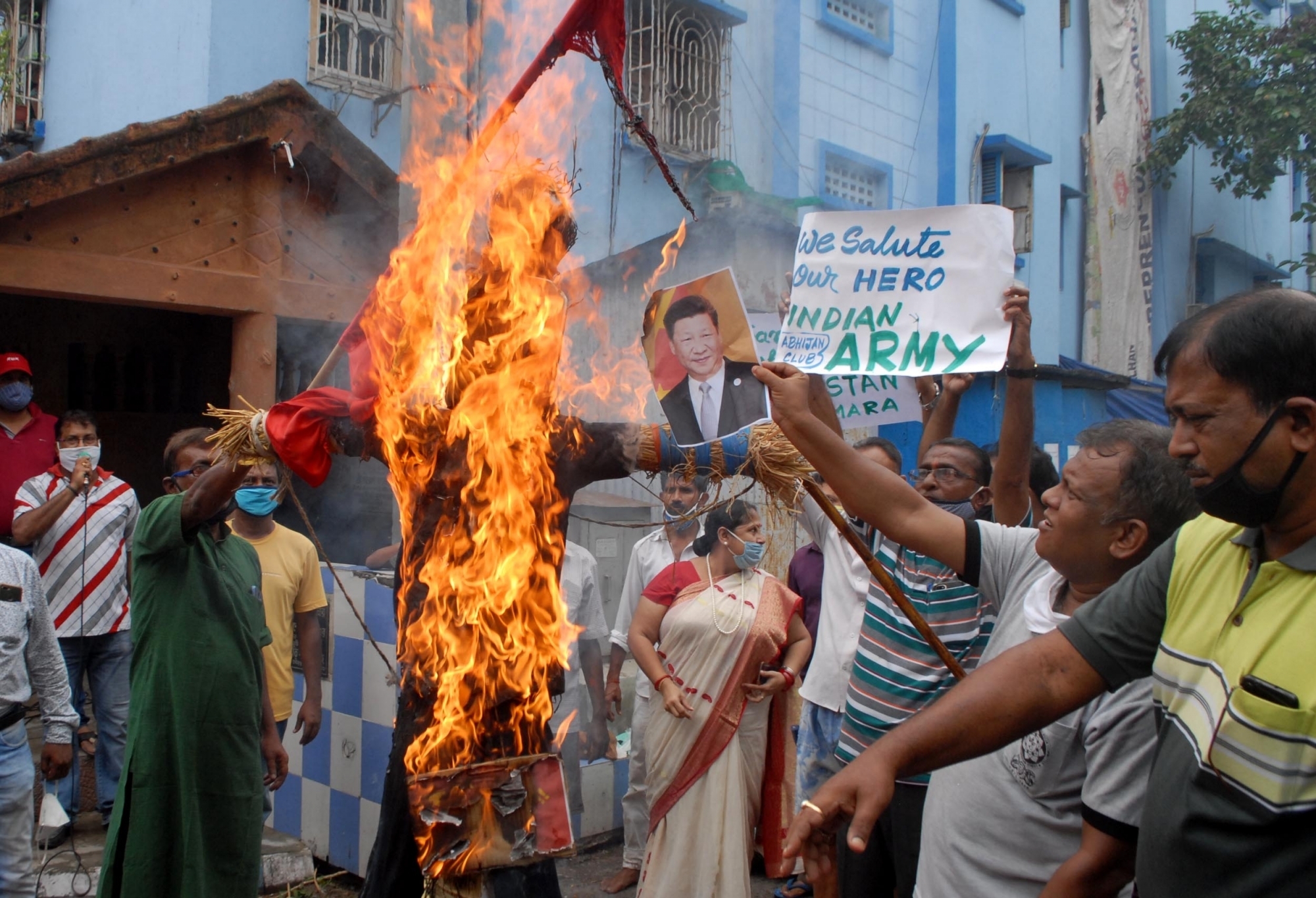 Kolkata: People burn an effigy of Chinese President Xi Jinping as they stage a demonstration against China over the brutal attack on Indian Army personnel at Galwan valley at the Line of Actual Control that has killed 20 Indian soldiers during the Indo-Chinese face off in Ladakh; in Kolkata on June 18, 2020. (Photo: IANS)