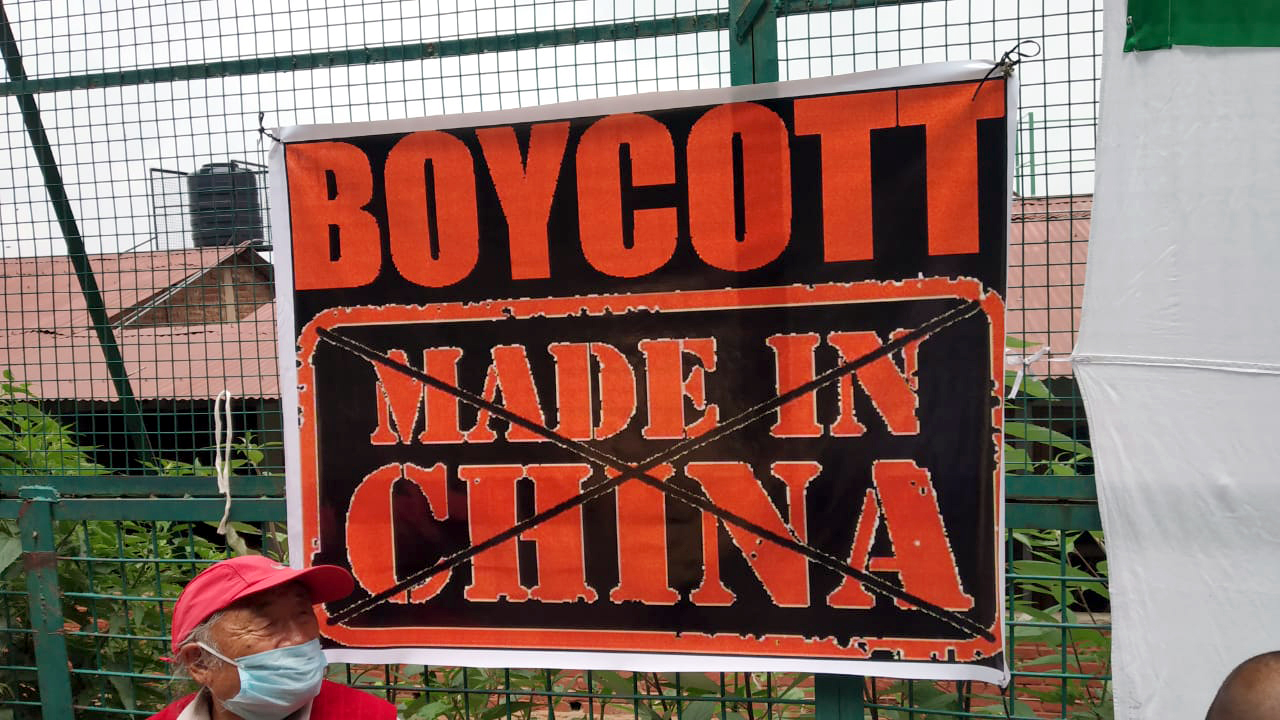 Members of Tibetan Youth Congress protest against China