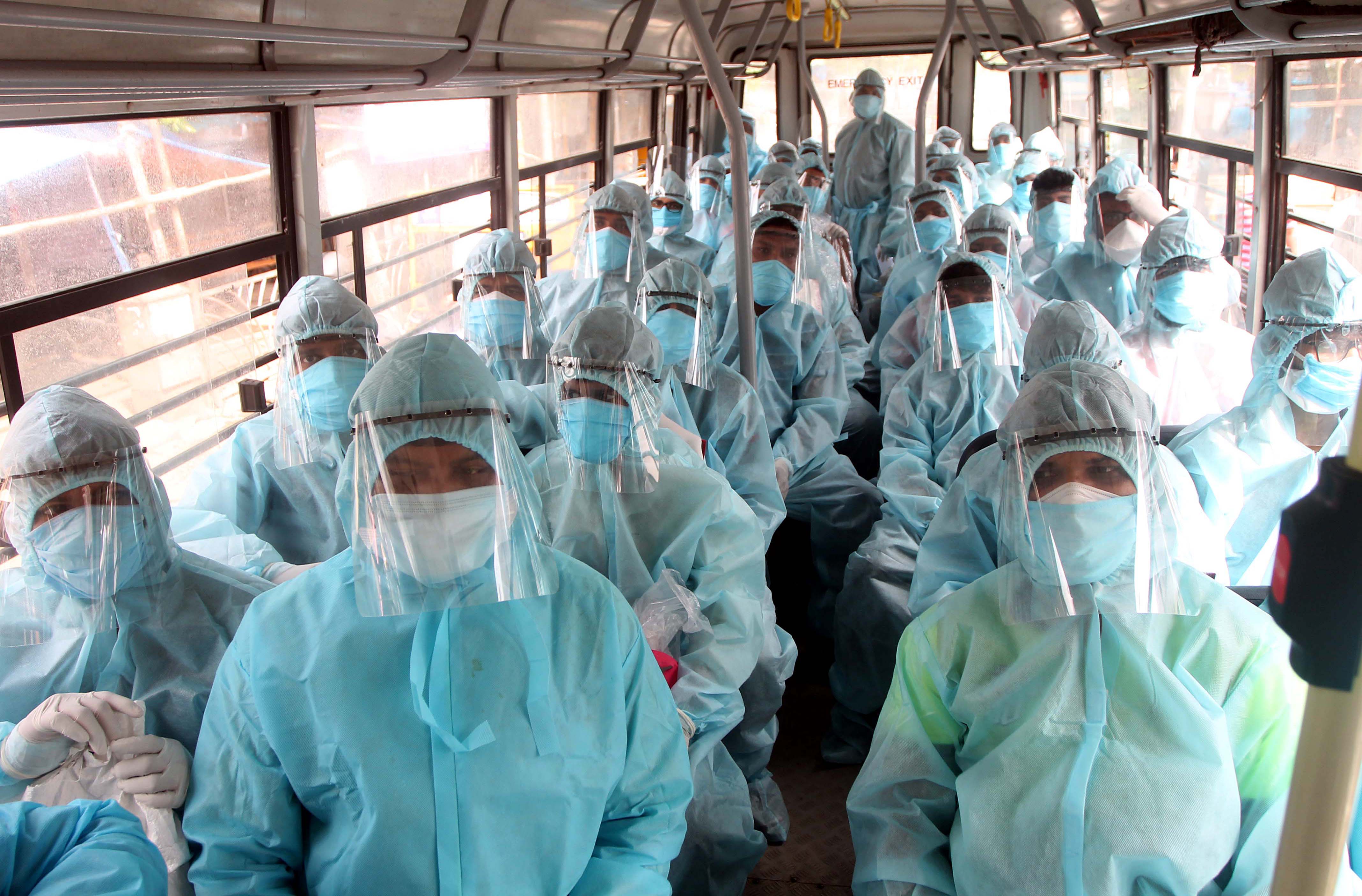 RSS workers and volunteers wearing protective suits
