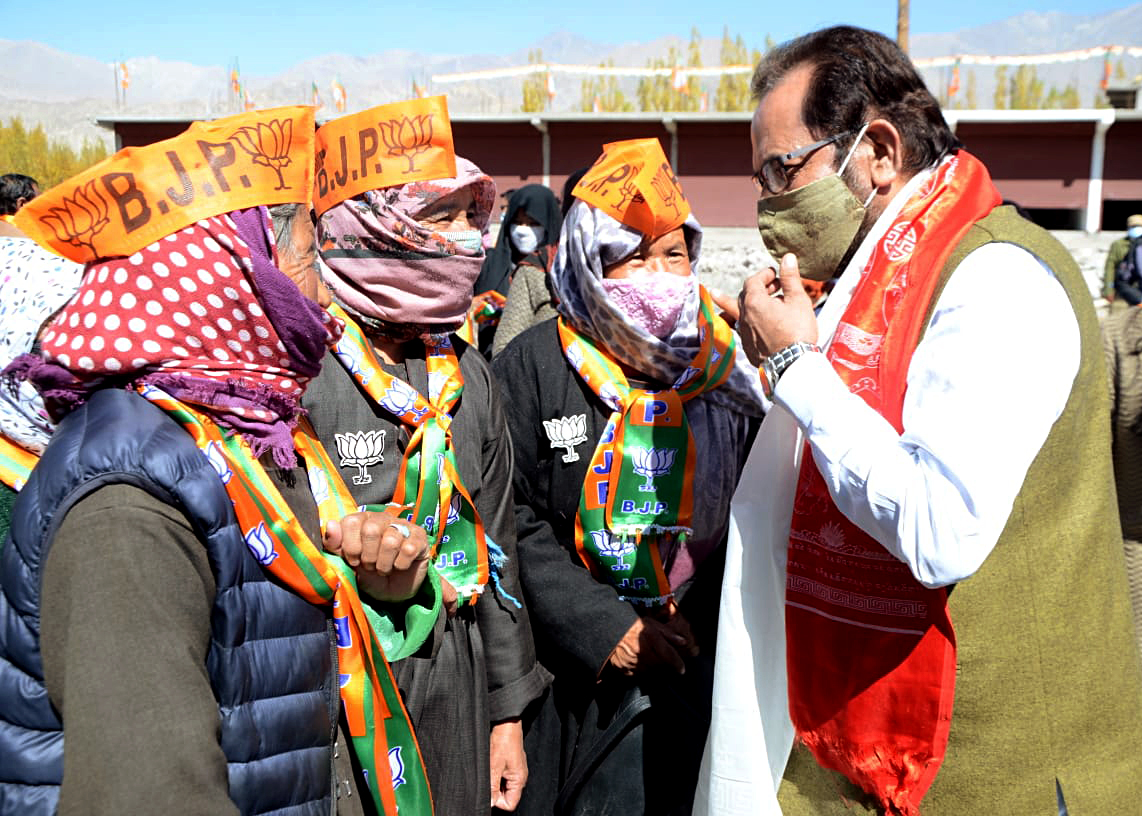 BJP leader and Union Minister Mukhtar Abbas Naqvi interact with people from various sections during his visit to Leh