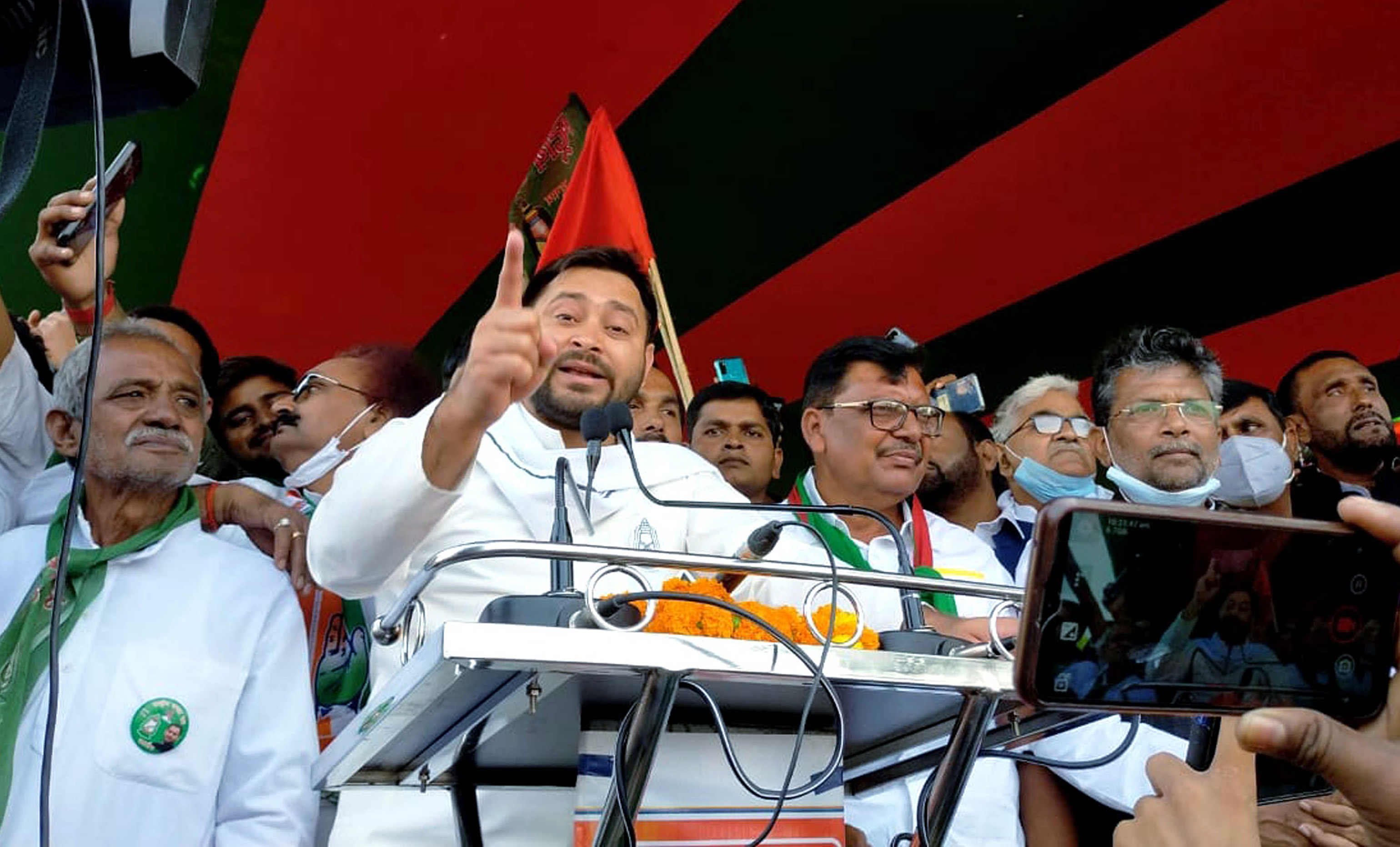 Rashtriya Janta dal (RJD) leader Tejashwi Yadav addresses an election rally a