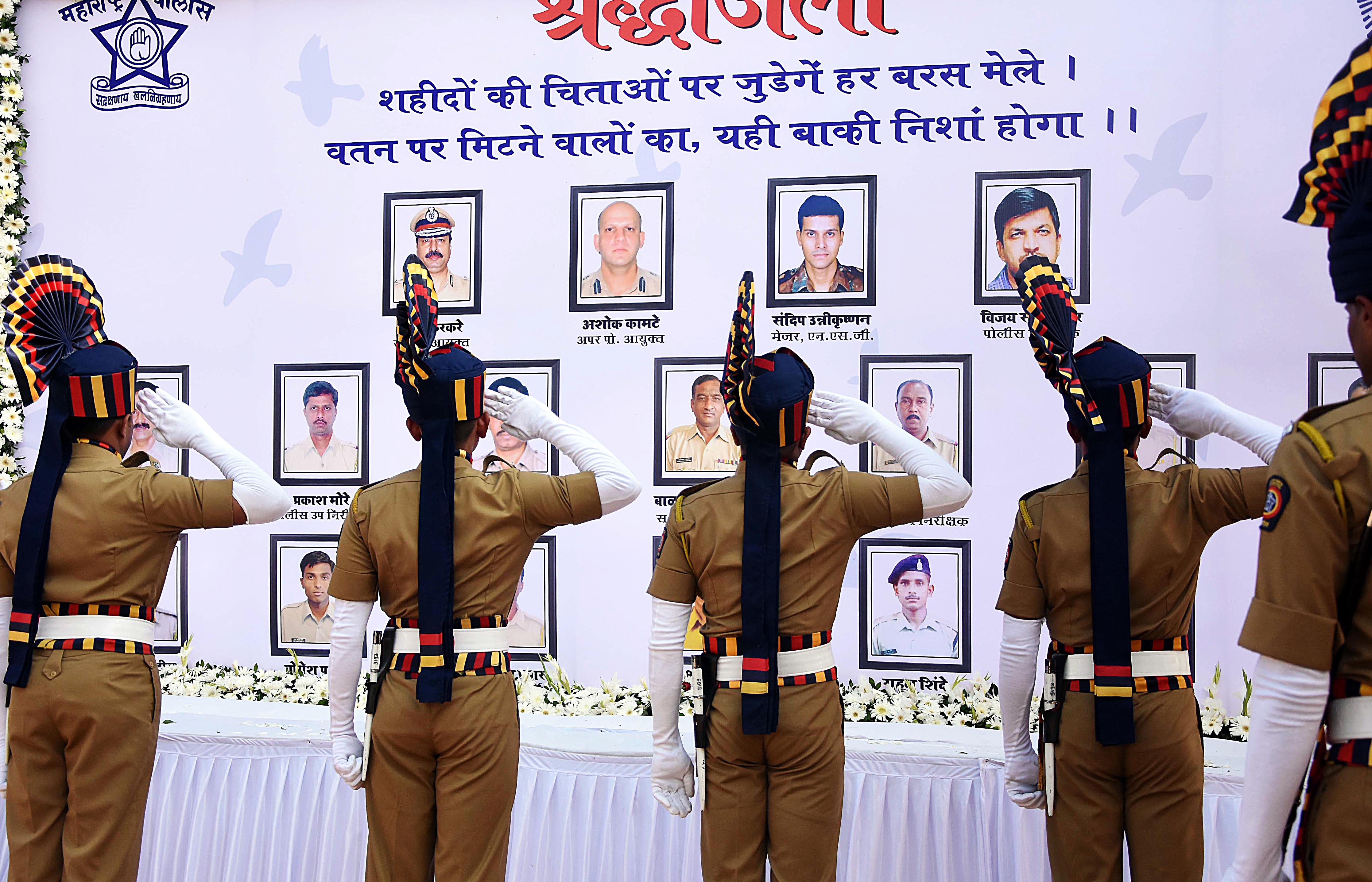 Police personnel pay homage at Martyrs' Memorial, at Police Gymkhana