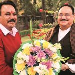 BJP chief J.P. Nadda (right) with his twin brother Jagat Bhushan Nadda on their birthday on Wednesday