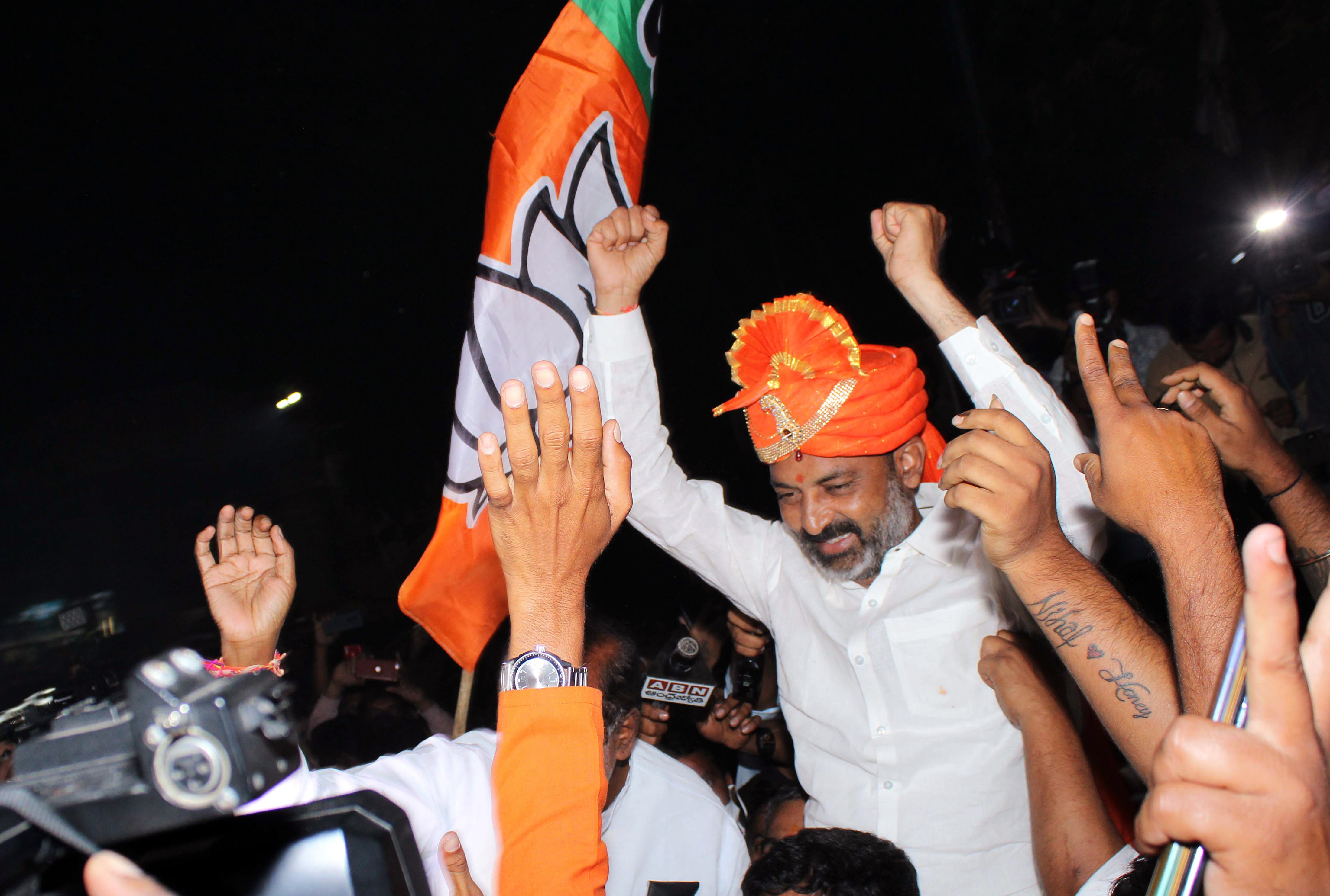 BJP TS President Bandi Sanjay along with supporters during GHMC election victory celebrations
