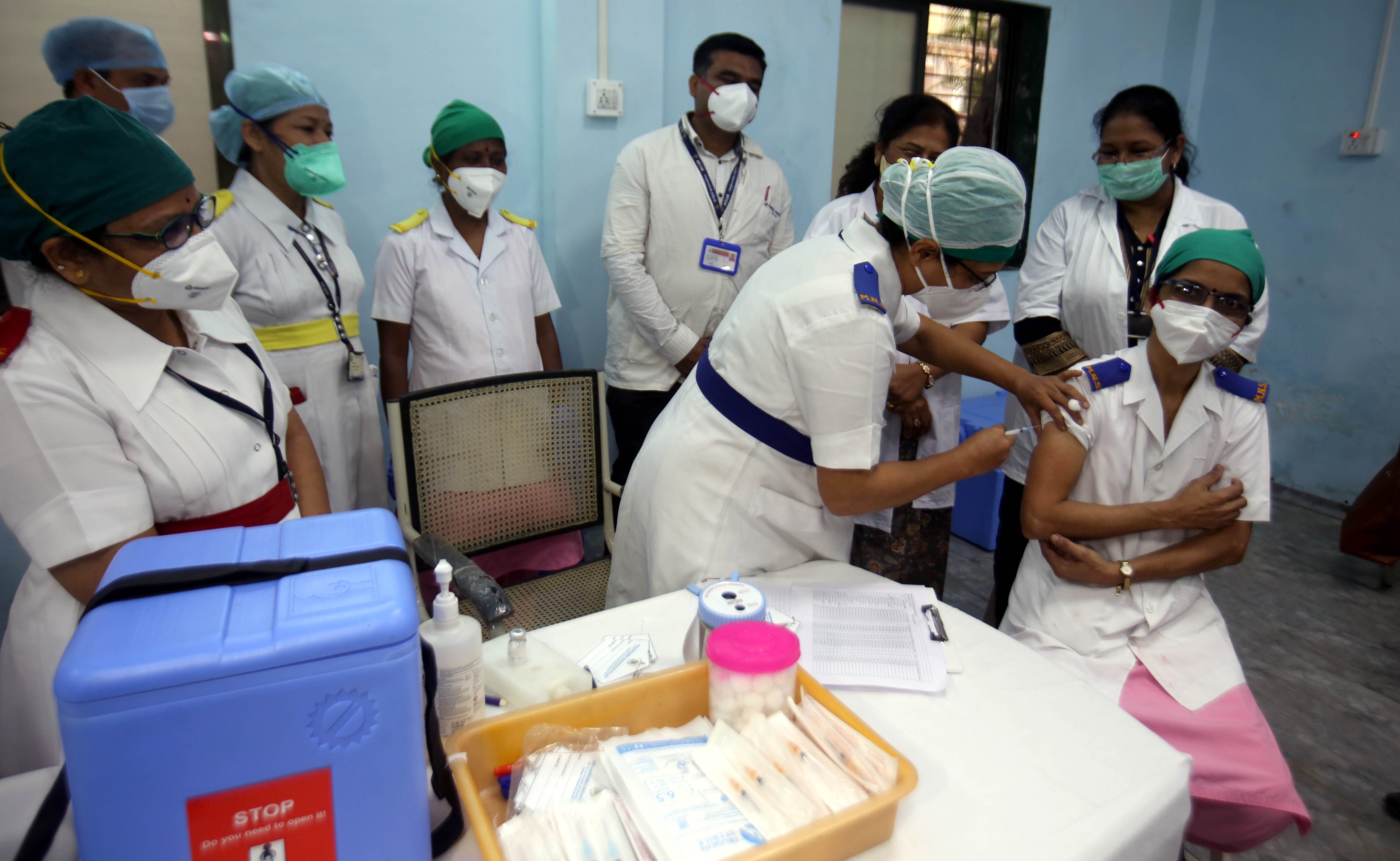 A health worker is seen inside a Covid-19 vaccination centre perform a trial run of COVID-19 vaccine