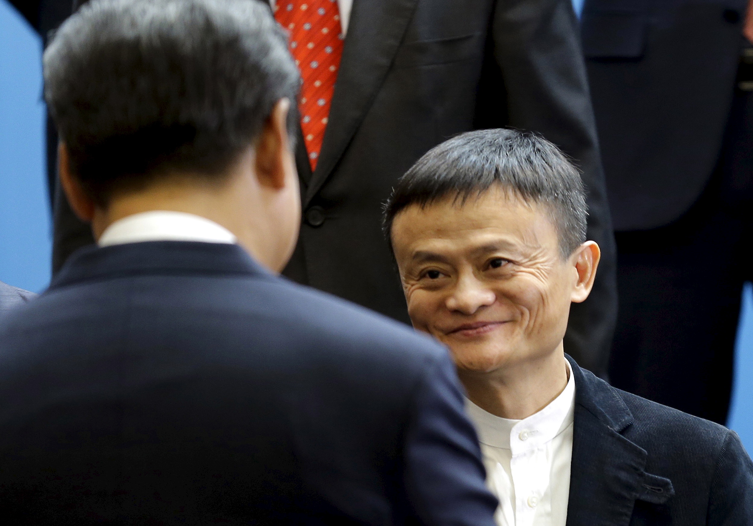 Chinese President Xi Jinping is greeted by Alibaba founder Jack Ma at Microsoft's main campus in Redmond, Washington