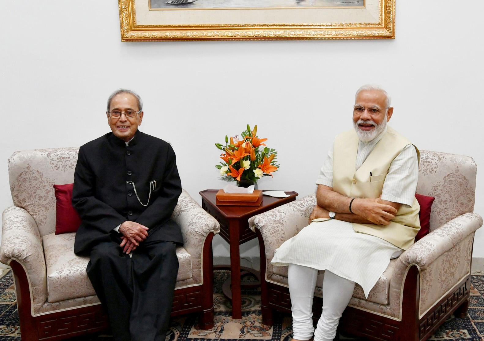Prime Minister Narendra Modi meets former President Pranab Mukherjee at his residence