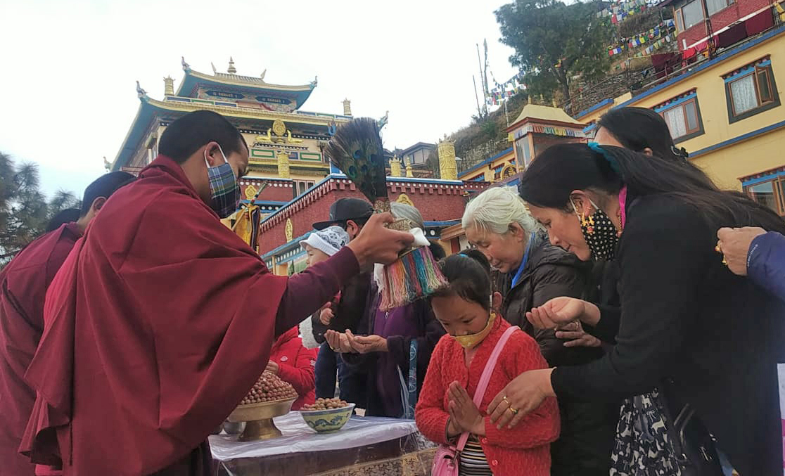 Tibetan Buddhist monks in-exile offer prayers to welcome the Iron Ox Year 2148