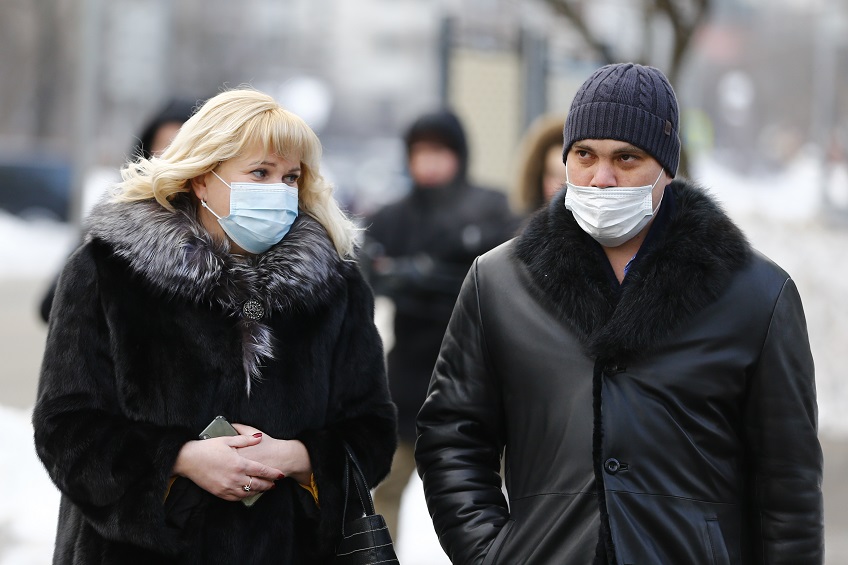 Olga Mikhailova and Vadim Kobzev, lawyers of Russian opposition leader Alexei Navalny, walk outside the court in Moscow