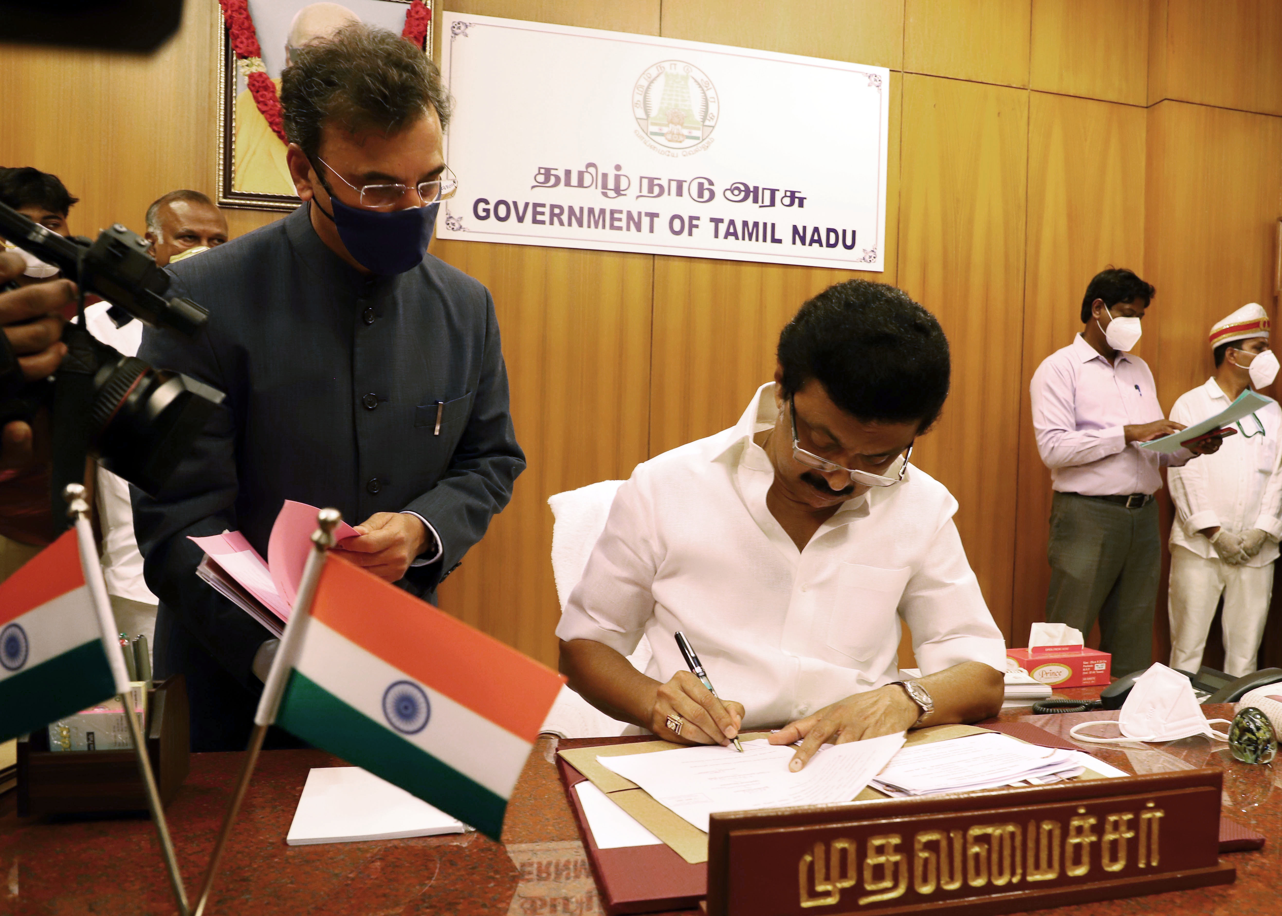 Tamil Nadu Chief Minister M. K Stalin does his first signature at his office