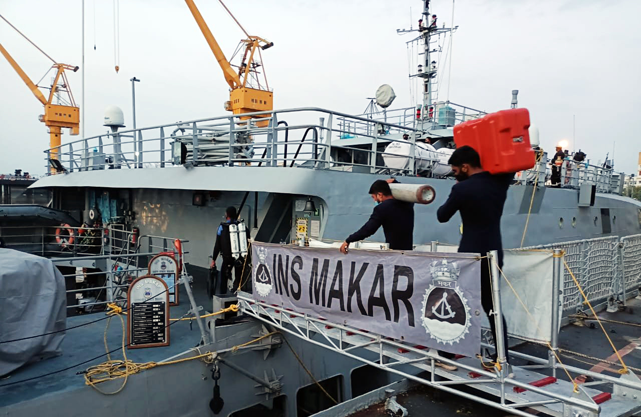 Specialized diving teams of Indian Navy board INS Makar with side scan sonar & INS Tarasa for SAR operation for missing crew of Barge P305 & Tug Varapradha