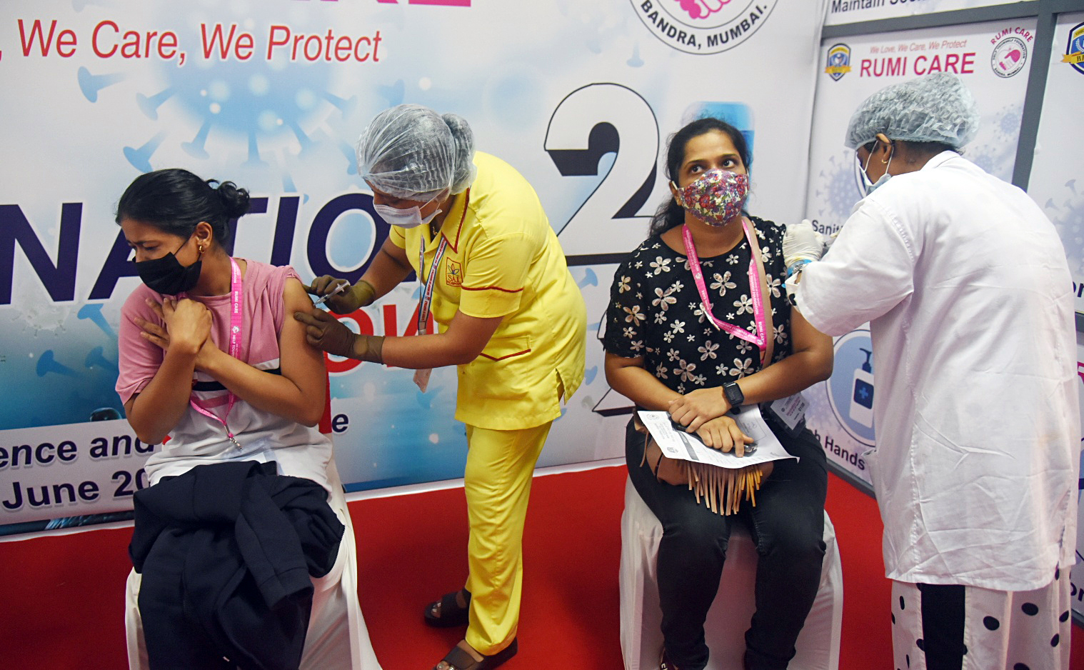 Medics inoculates the dose of the COVID19 vaccine to family members of Mumbai Police