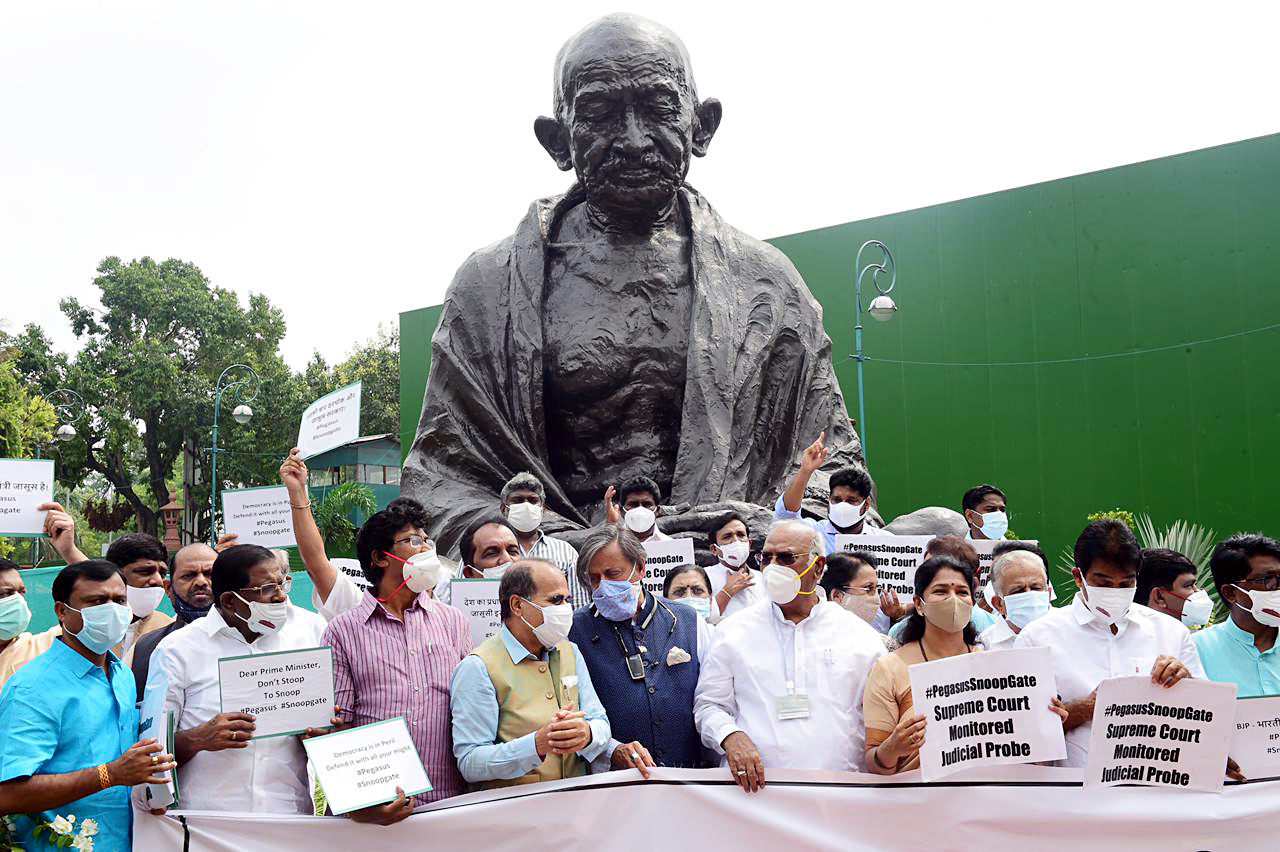 LoP Rajya Sabha Mallikarjun Kharge and Lok Sabha MP Shashi Tharoor during a protest against the Pegasus snooping issue