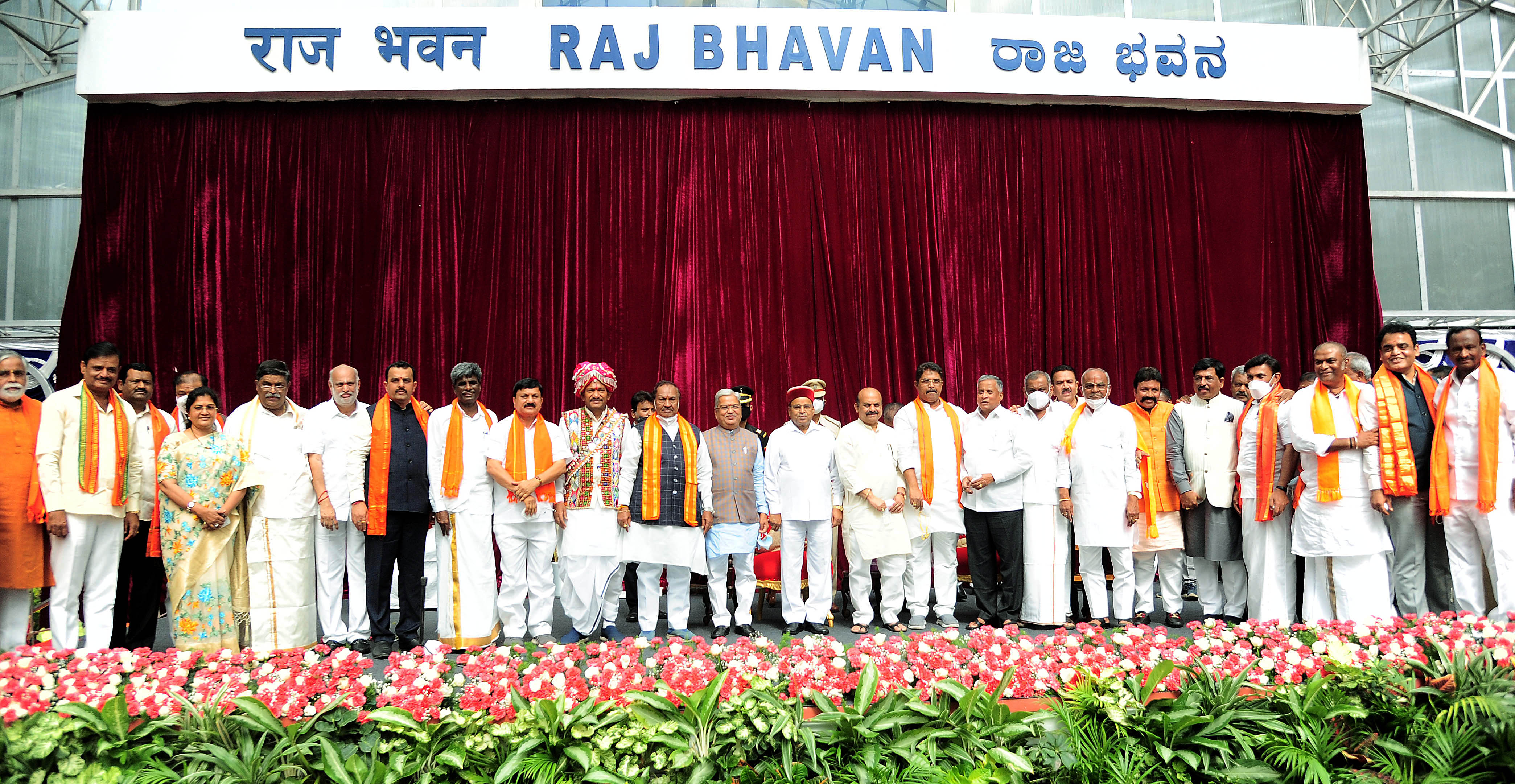 Karnataka Governor Thawar Chand Gehlot and Karnataka Chief Minister Basavaraj Bommai with newly inducted ministers during the swearing-in ceremony