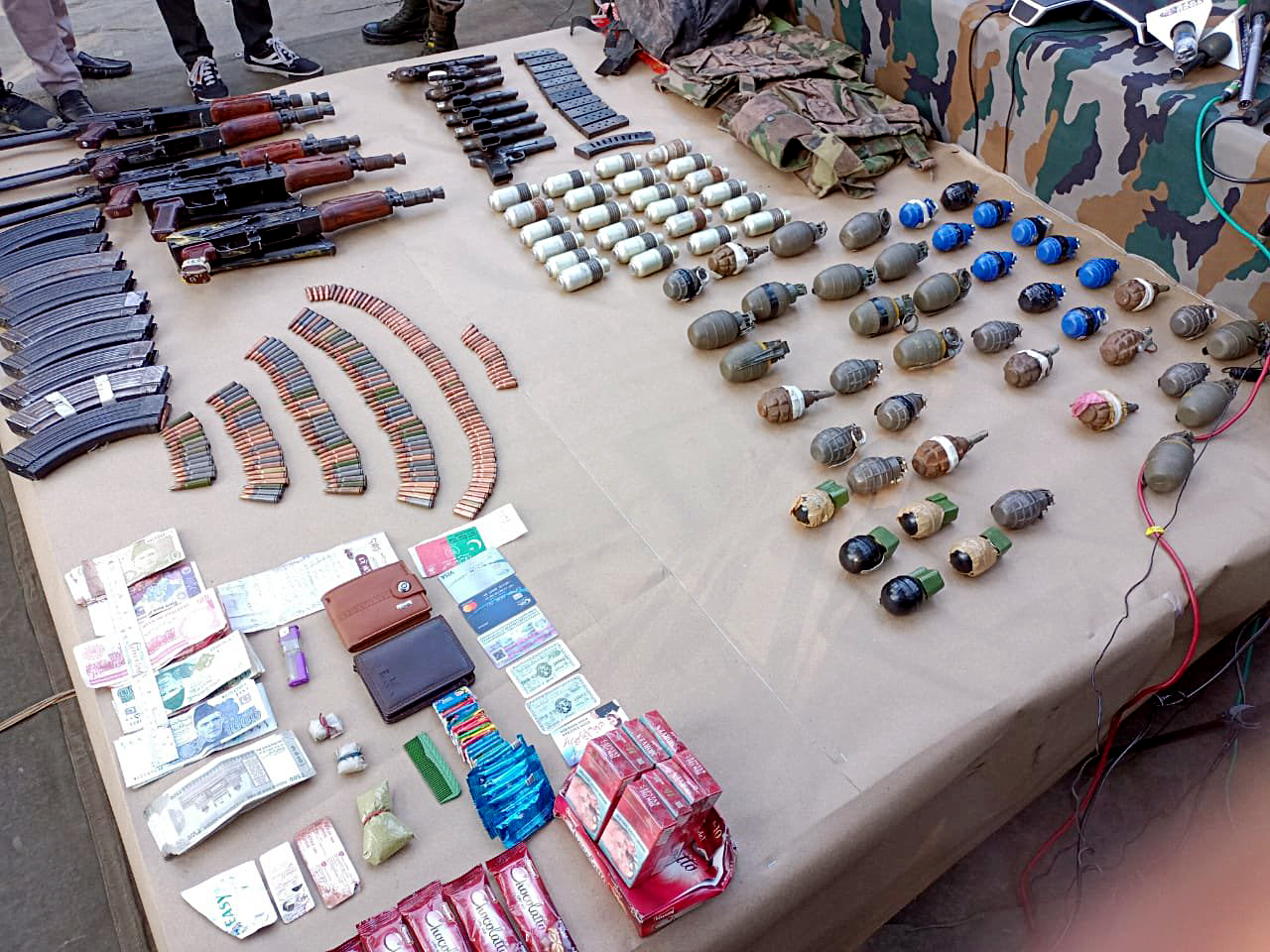 Indian Army recovers a cache of arms and ammunition during an encounter