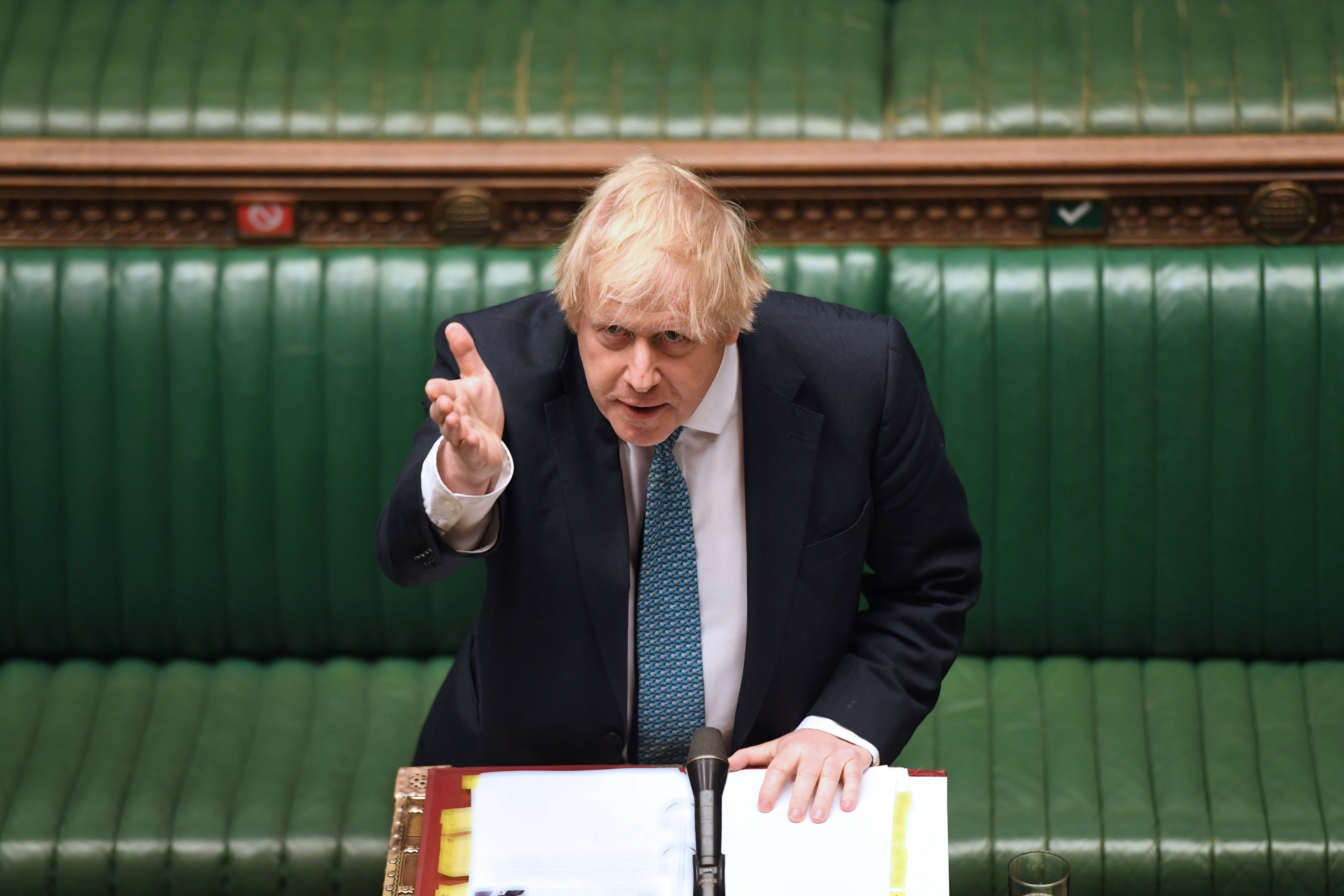 Britain's Prime Minister Boris Johnson speaks during a parliament session, amid the coronavirus disease (COVID-19) outbreak