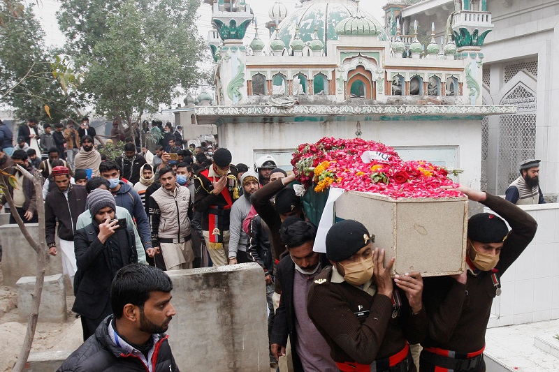 People attend funeral of Captain Bilal Khalil, who was killed in an attack on a military base in Nushki, in Faisalabad