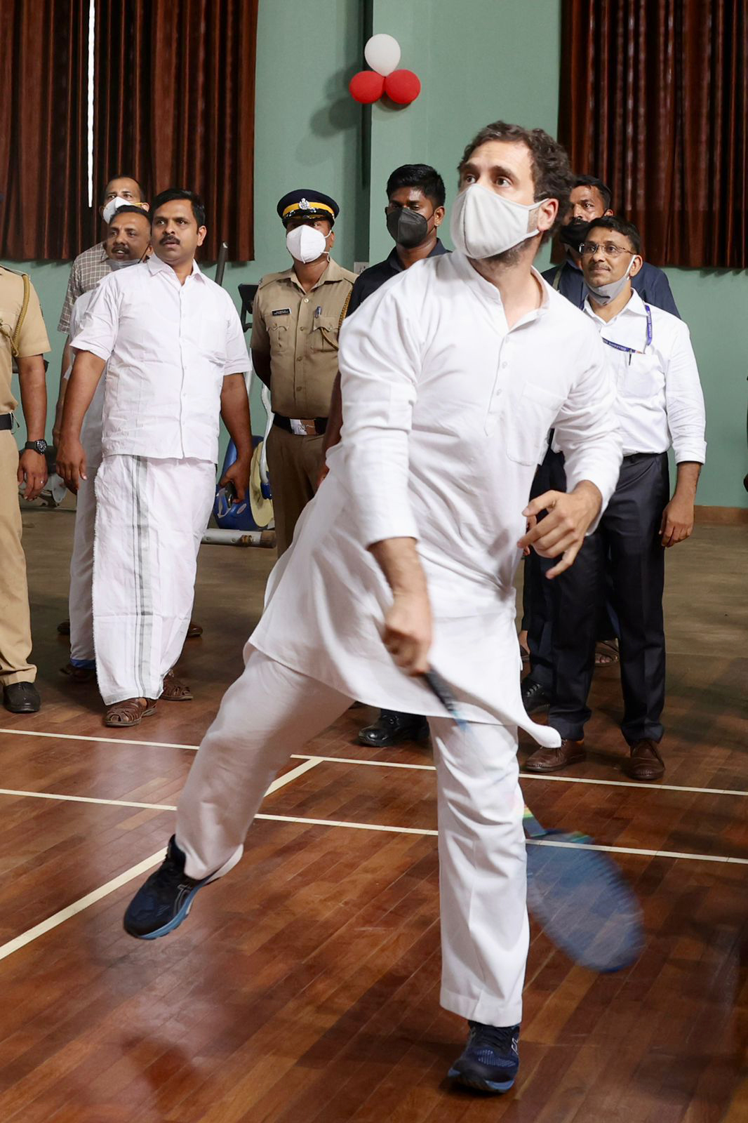 Rahul Gandhi enjoys a game of badminton at the inauguration of an indoor stadium