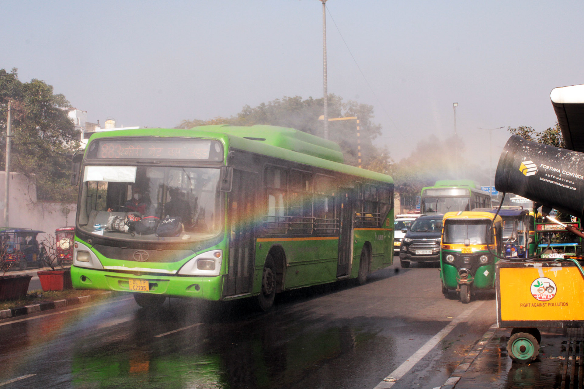 A rainbow is created when an anti-smog gun is being used