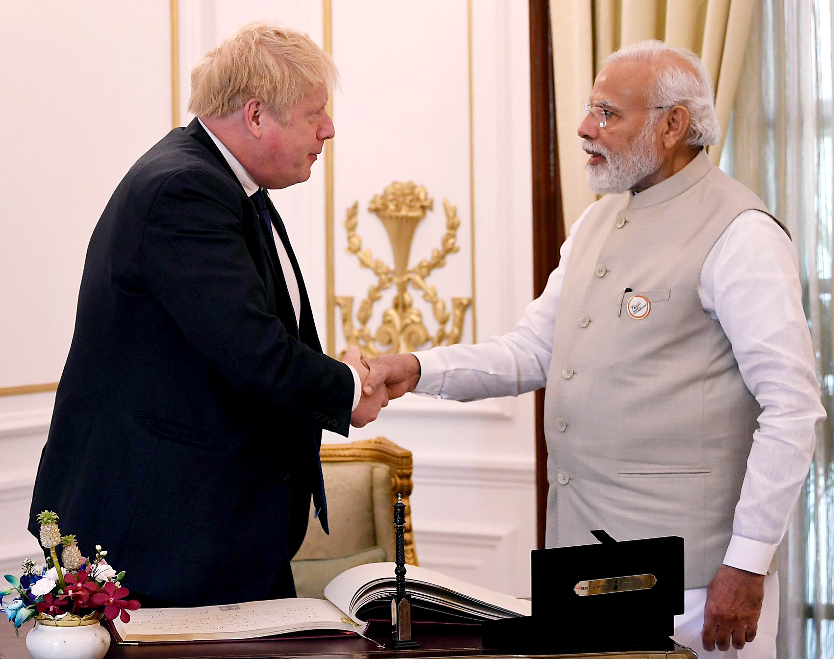 Prime Minister Narendra Modi shakes hand with United Kingdom Boris Johnson